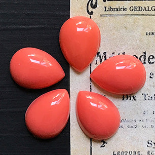 pear-shaped glass cabochon in red for jewelry making