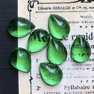 pear-shaped glass cabochon in green for jewelry making