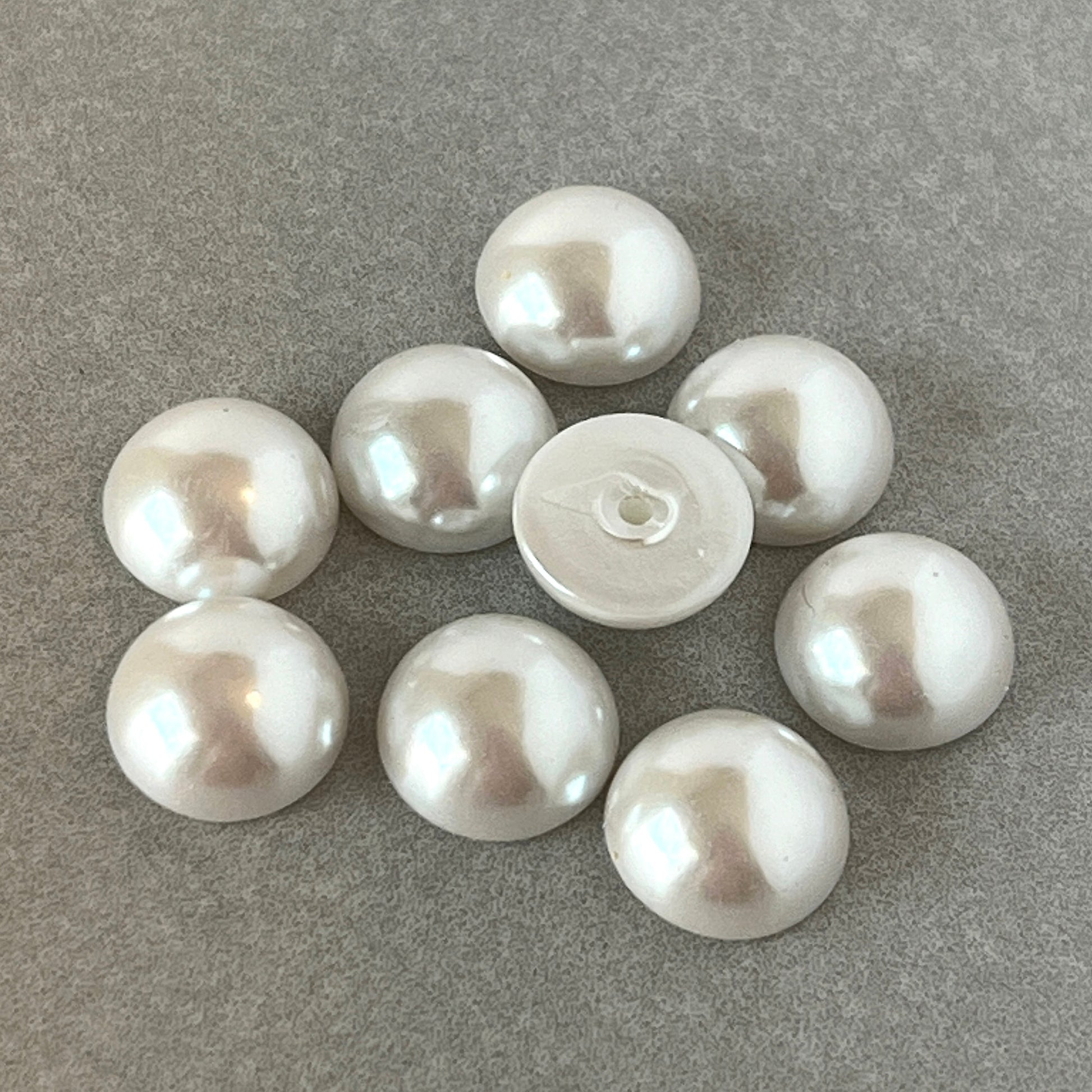 pear-shaped glass cabochon in white for jewelry making