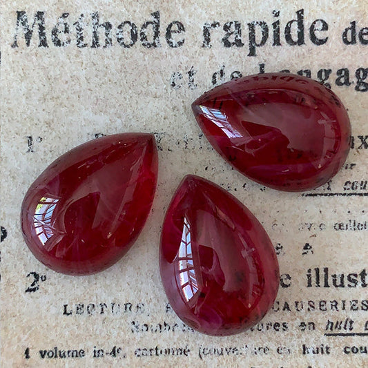 pear-shaped glass cabochon in red for jewelry making